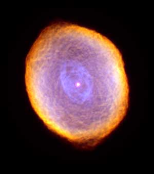 Glowing like a multi-faceted jewel, the planetary nebula IC 418 lies about 2,000 light-years from Earth in the constellation Lepus. (HST image)